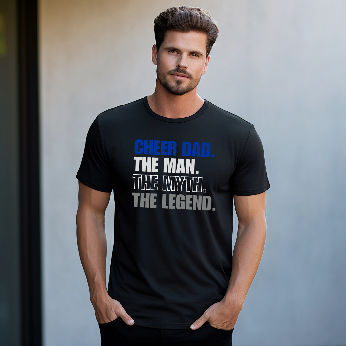 Man wearing a black t-shirt with 'CHEER DAD THE MAN. THE MYTH. THE LEGEND.' text.